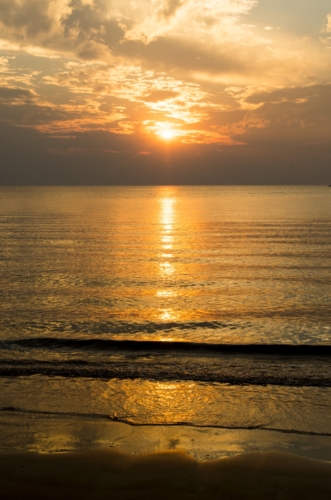 Západ slunce na Mildil beach
